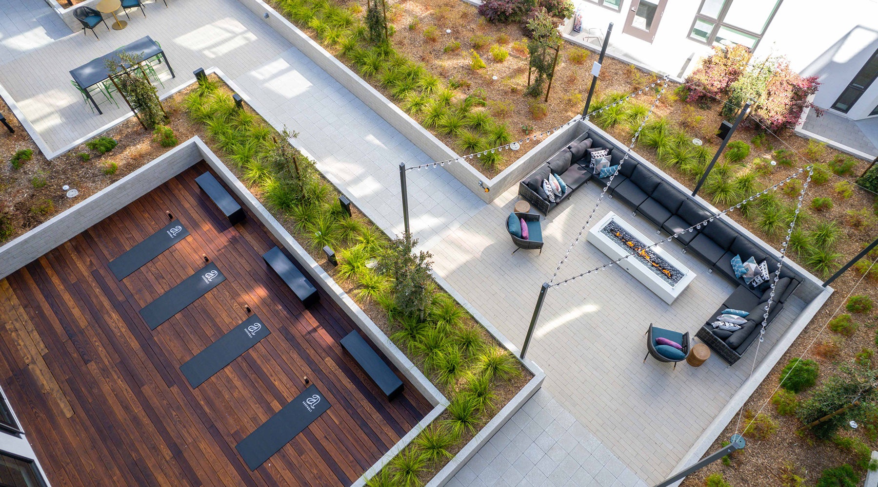 aerial shot of outdoor patio with seating and yoga mats